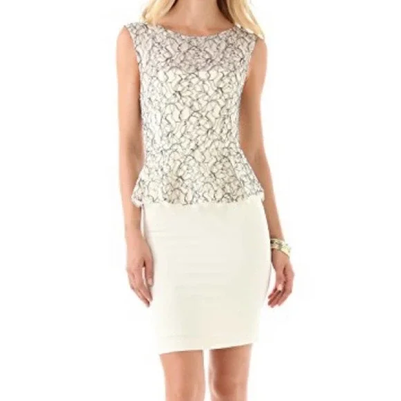open lace back dress Chic Open Back Peplum Dress – Geeda J Fashion Boutique main image 0